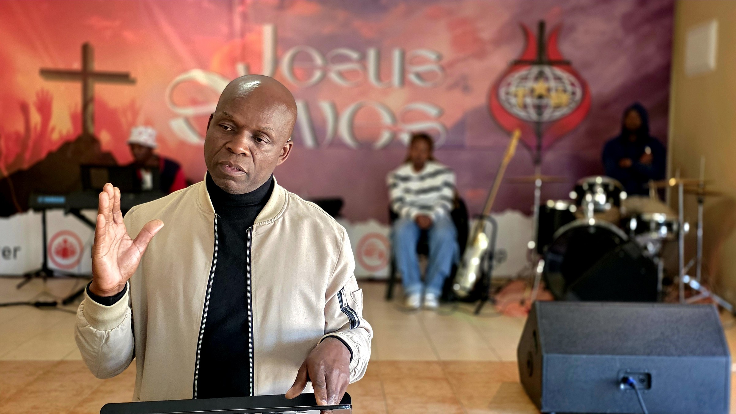 Pastor preaching during a Sunday service at Church of God of Prophecy, Lobatse